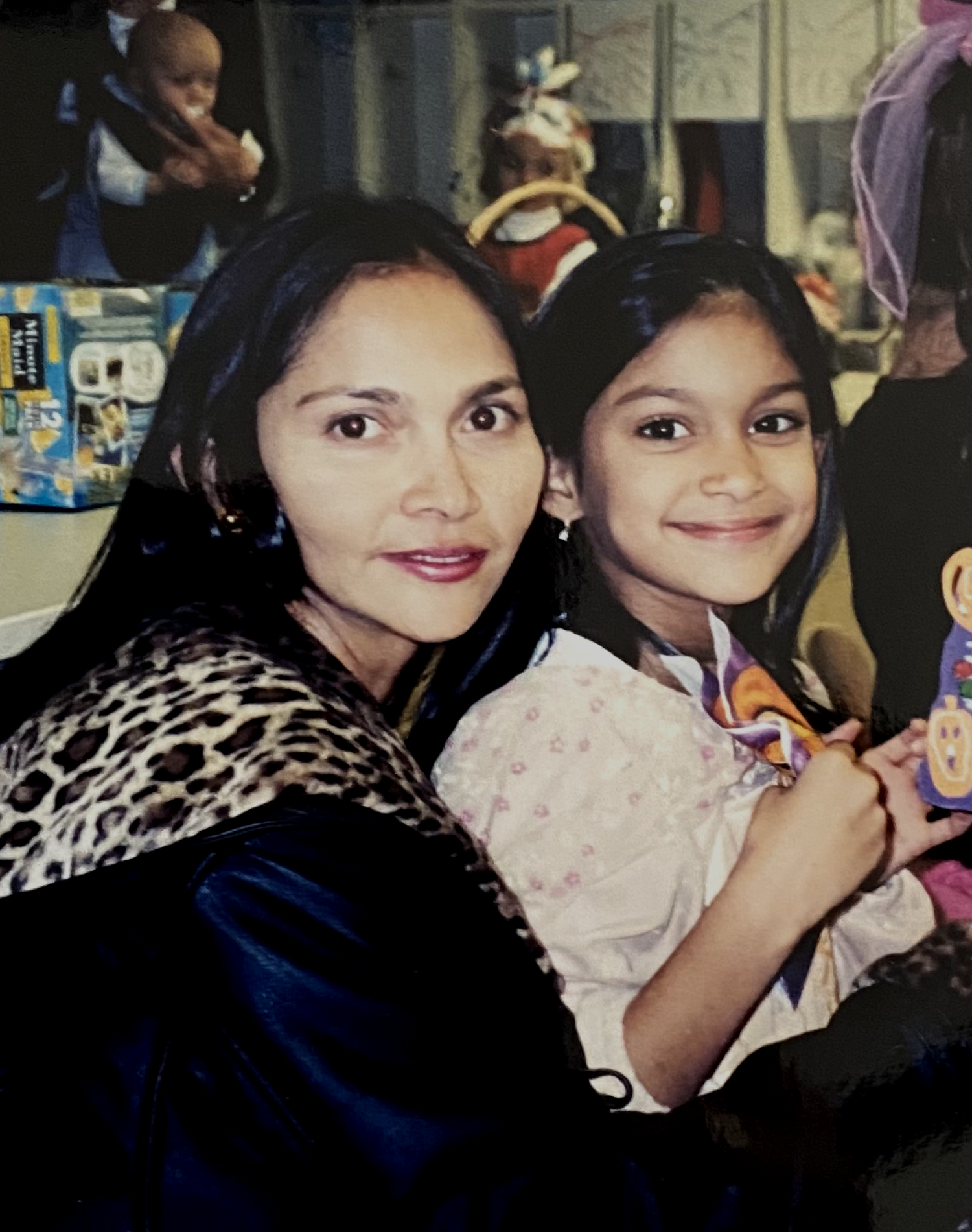 Aruna Swarup with child, showcasing connection and inner balance through Ayurveda and meditation practices