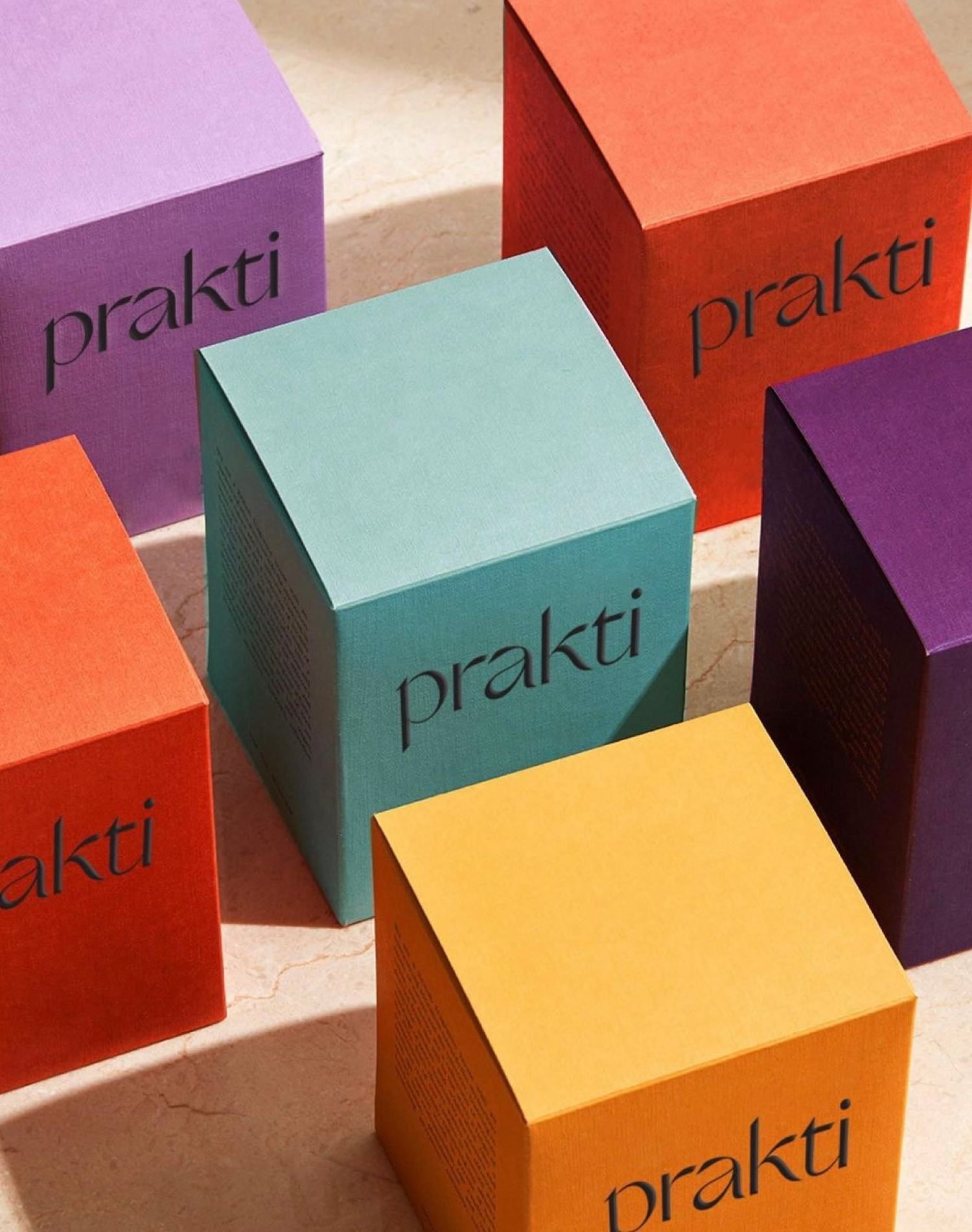 Colorful sustainable Prakti skincare product packaging promoting Earth Day balance and sustainability.